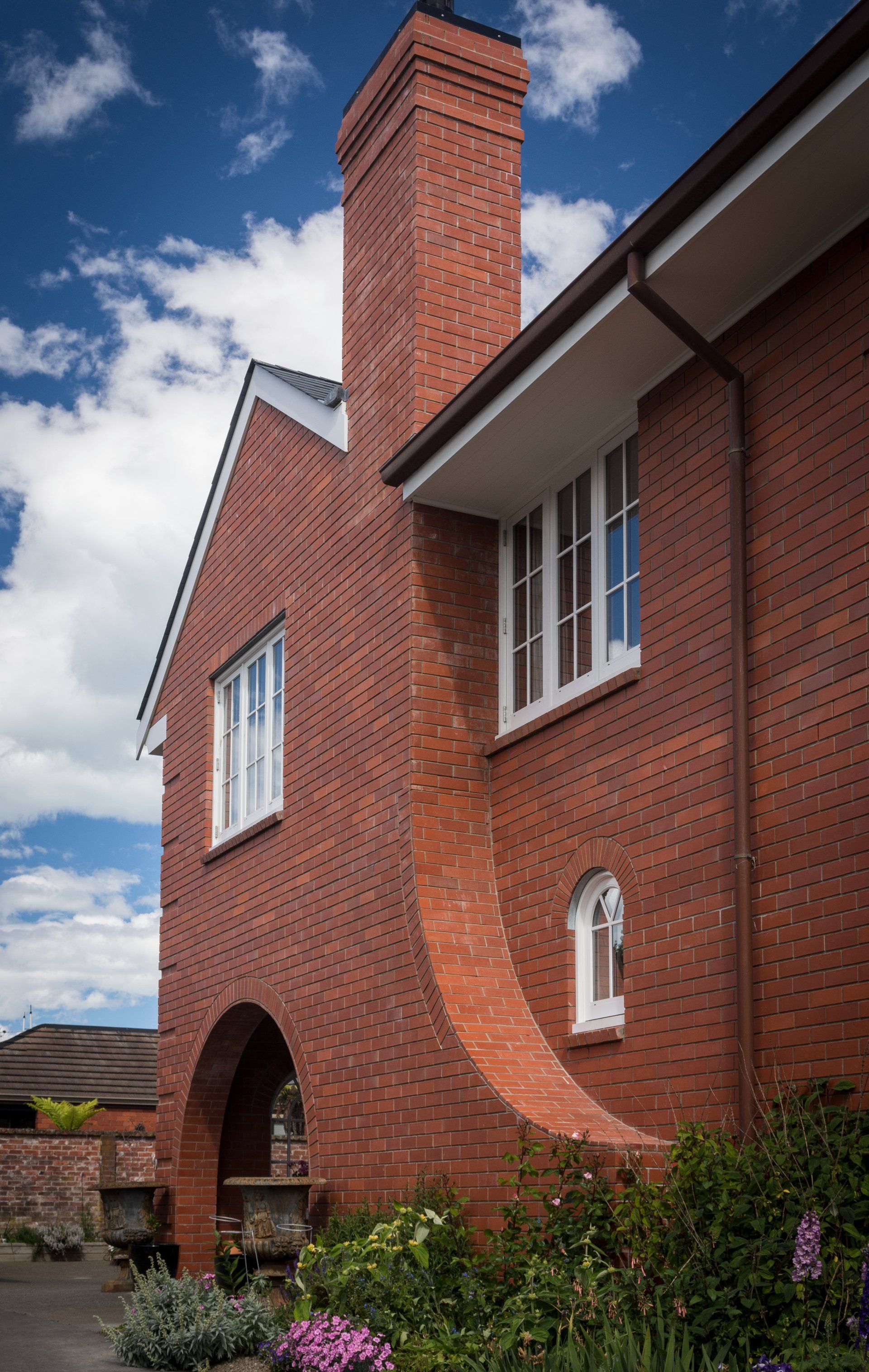 A brick building with a chimney on top of it