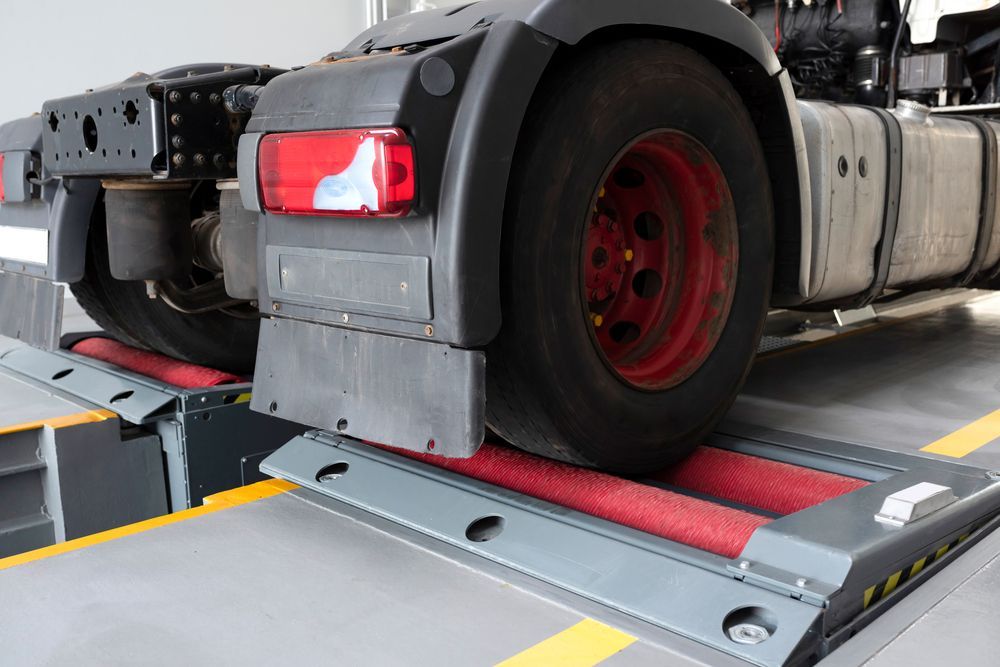 Truck on a Dynamometer Platform in a Garage — Forster Smash Repairs in Forster, NSW