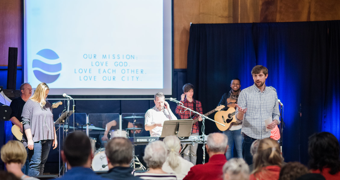 Pastor Preaching to Congregation