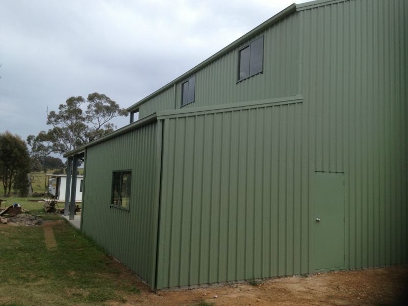 A Green Building with a Door - Wallan, VIC - Victorian Garages & Barns