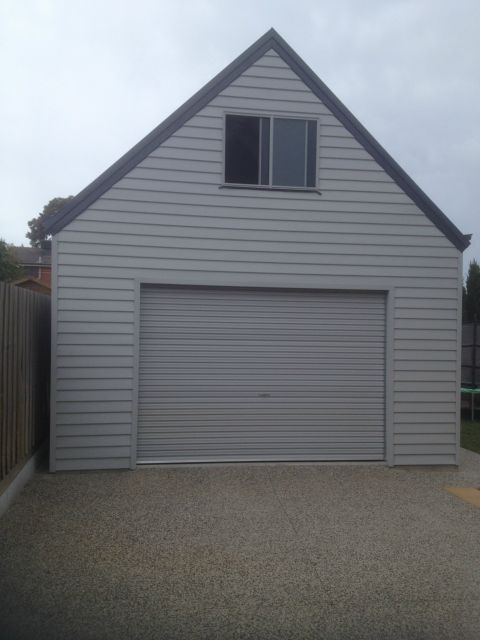 A White Garage with a Black Roof and a Window - Wallan, VIC - Victorian Garages & Barns