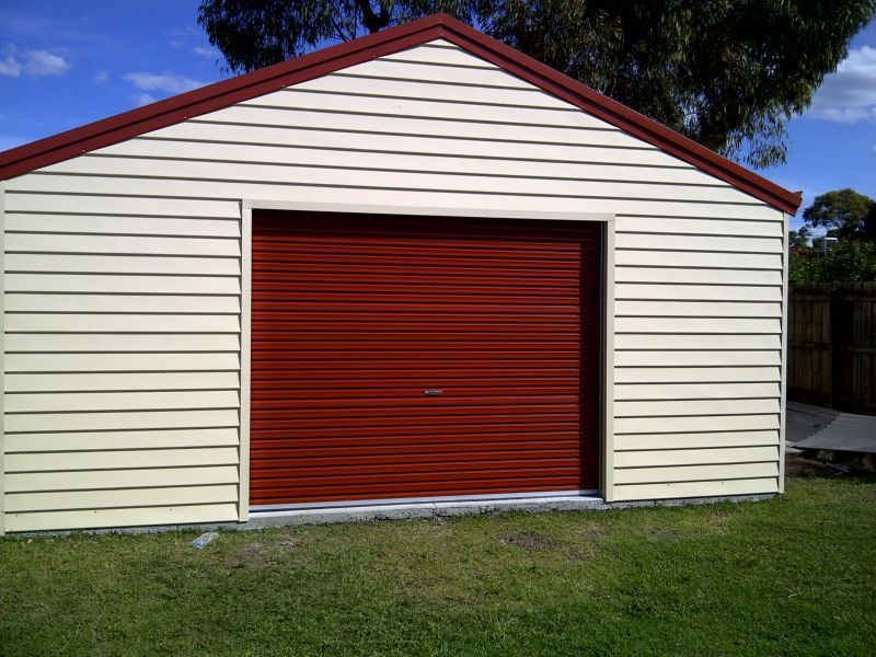 A White Garage with a Red Garage Door - Wallan, VIC - Victorian Garages & Barns
