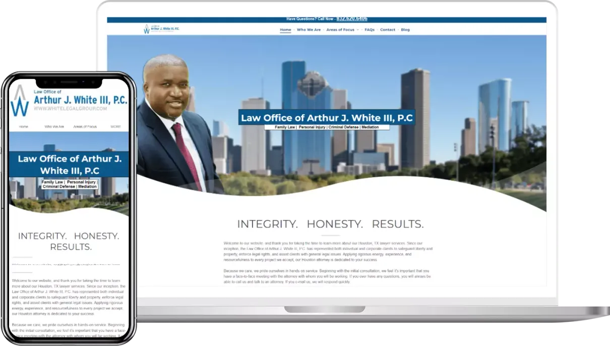 A laptop and a cell phone are displaying a website for a law firm.