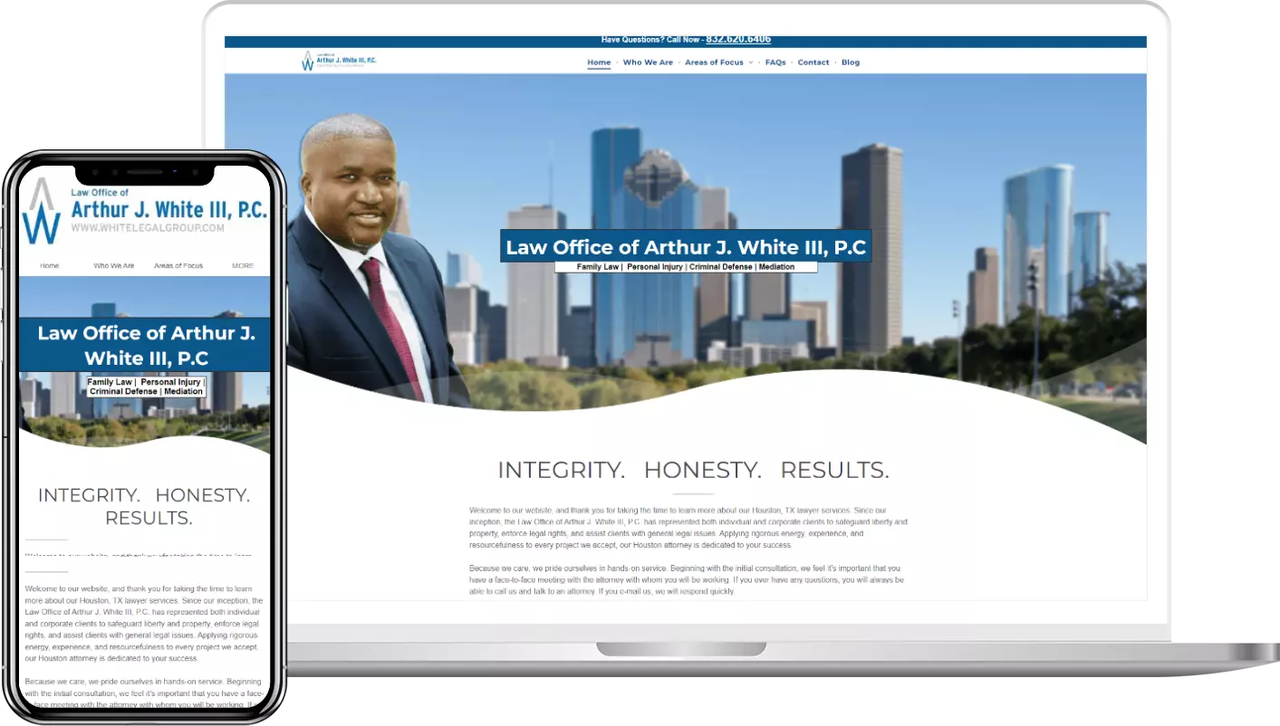 A laptop and a cell phone are displaying a website for a law firm.