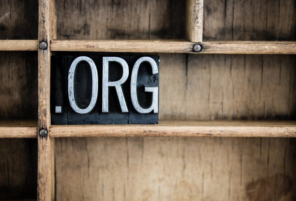 A wooden shelf with the word org written on it.