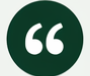 White quotation marks on a dark green circular icon.