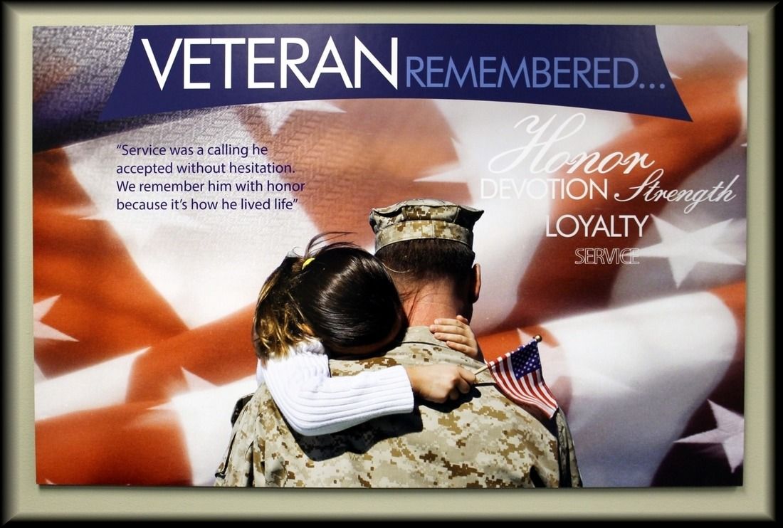 Soldier in uniform embraced by a child with American flag backdrop, honoring veterans.