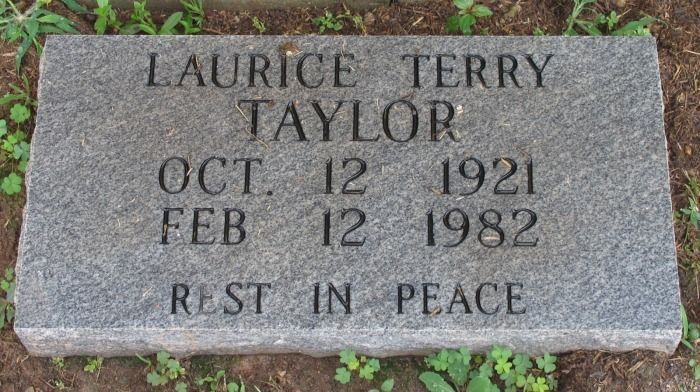 Gray granite headstone of Laurice Terry Taylor, inscribed with birth and death dates, and