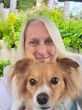 Jodi Jill founder of Puzzle Day with her adopted dog, June Bug