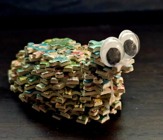 Jiggy insect made from jigsaw puzzle pieces
