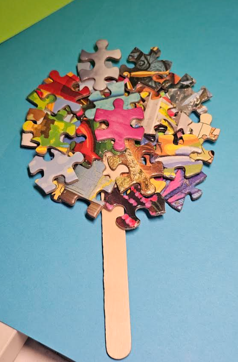 lollipop made from jigsaw puzzle pieces
