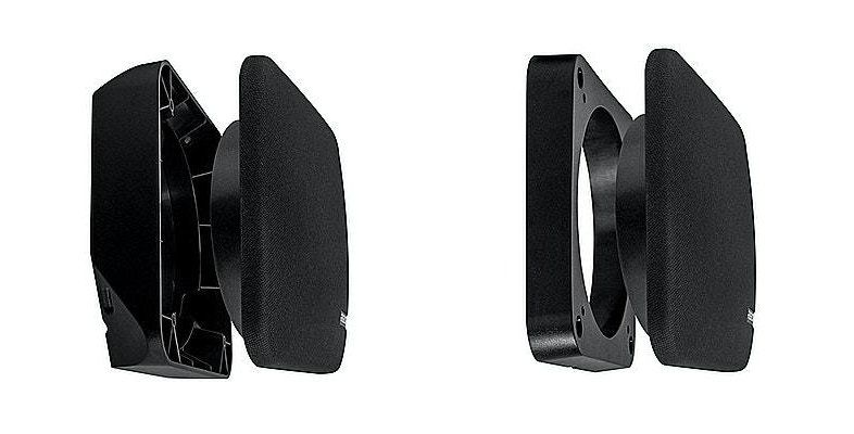 A pair of black speakers sitting next to each other on a white background.