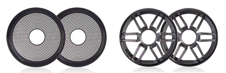 A pair of speaker covers with holes in them on a white background.
