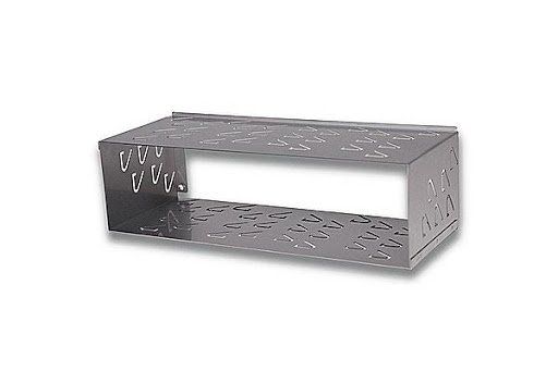 A metal box with holes in it is sitting on a white surface.