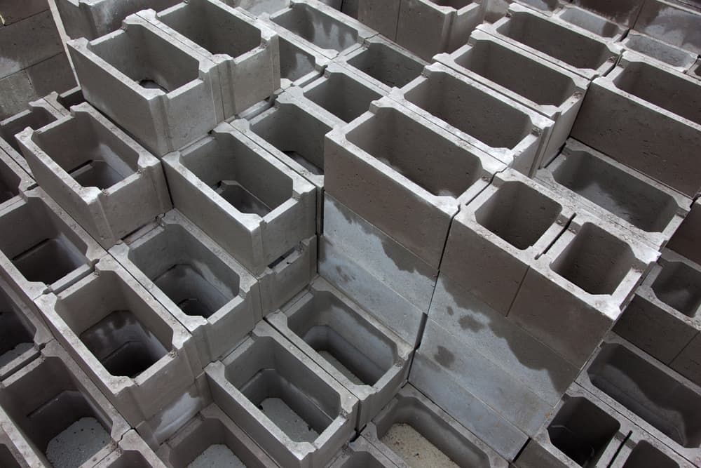 A Pile of Concrete Blocks Are Stacked on Top of Each Other — Greenline Recycling in Yatala, QLD