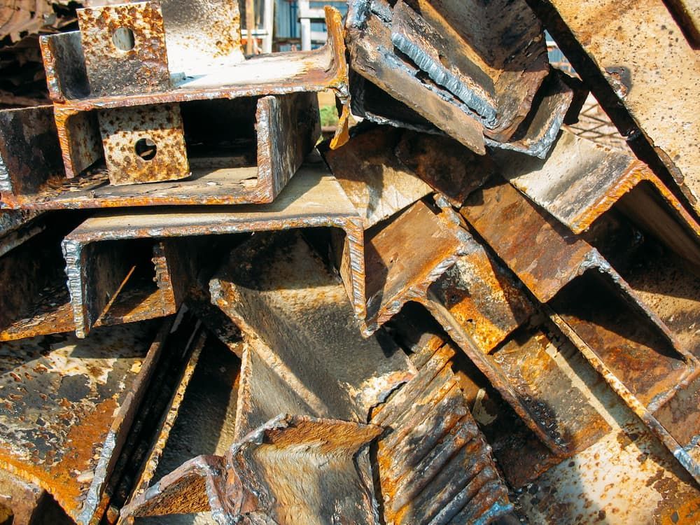 A Pile of Rusty Metal Pieces with A Few Pieces Missing — Greenline Recycling in Redland Bay, QLD