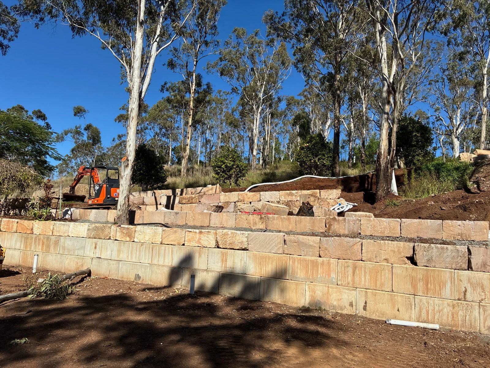 Terraced Stone Retaining Wall Under Construction — Barry's Recycling in Redland Bay, QLD