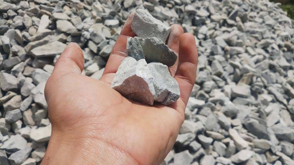 Holding A Rock In My Hand — Greenline Recycling in Redland Bay, QLD