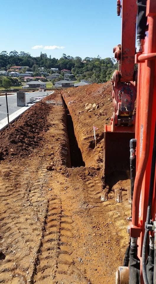 Orange Excavator Work in Progress in Ballina