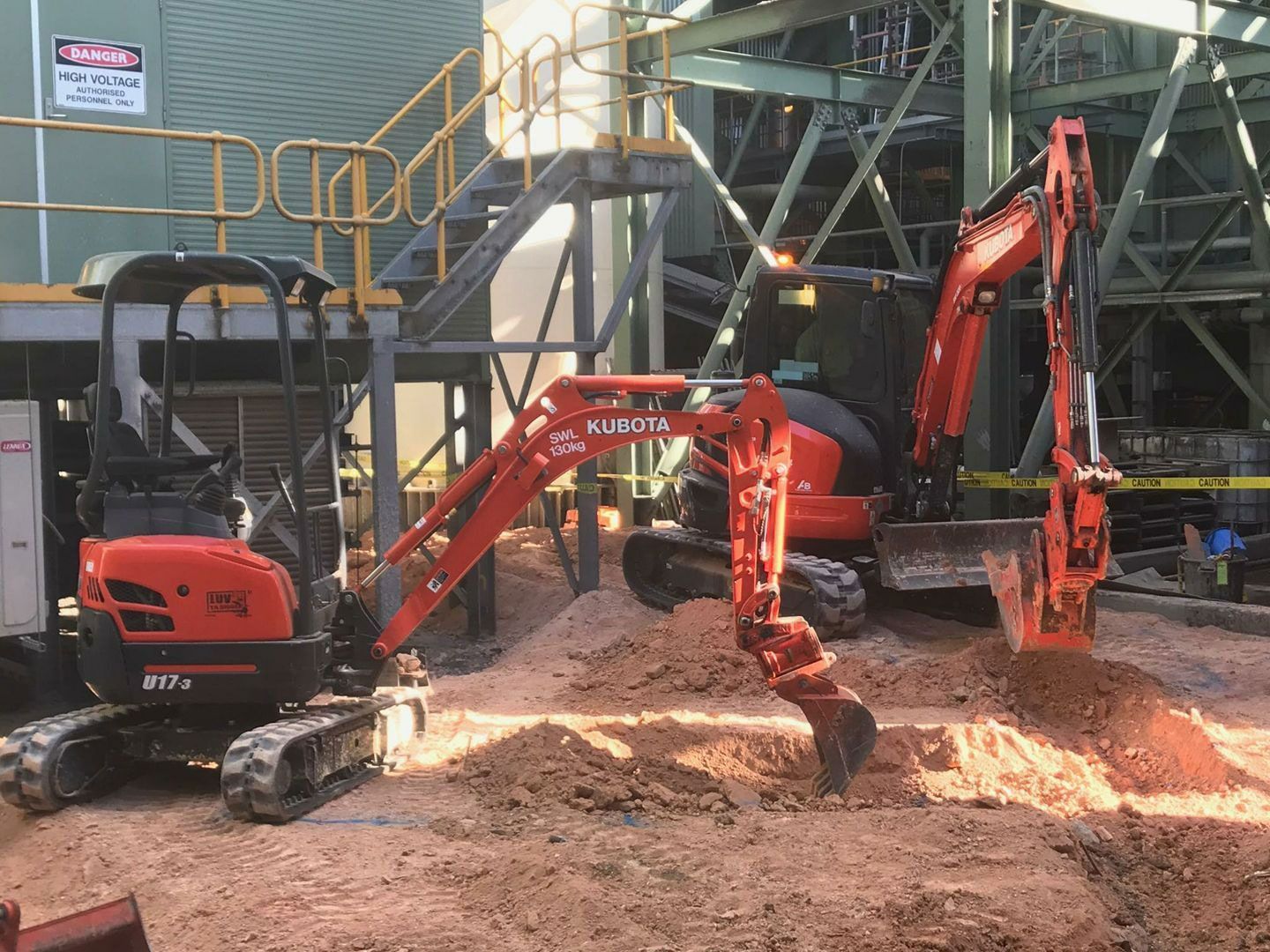 Two Mini Orange Excavator Hire In Ballina