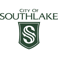 The city of southlake logo is a shield with a letter s on it.