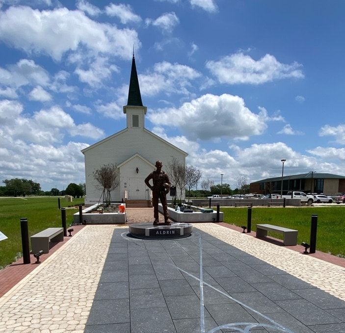 A statue of Buzz Aldrin at the RELLIS Administration Complex