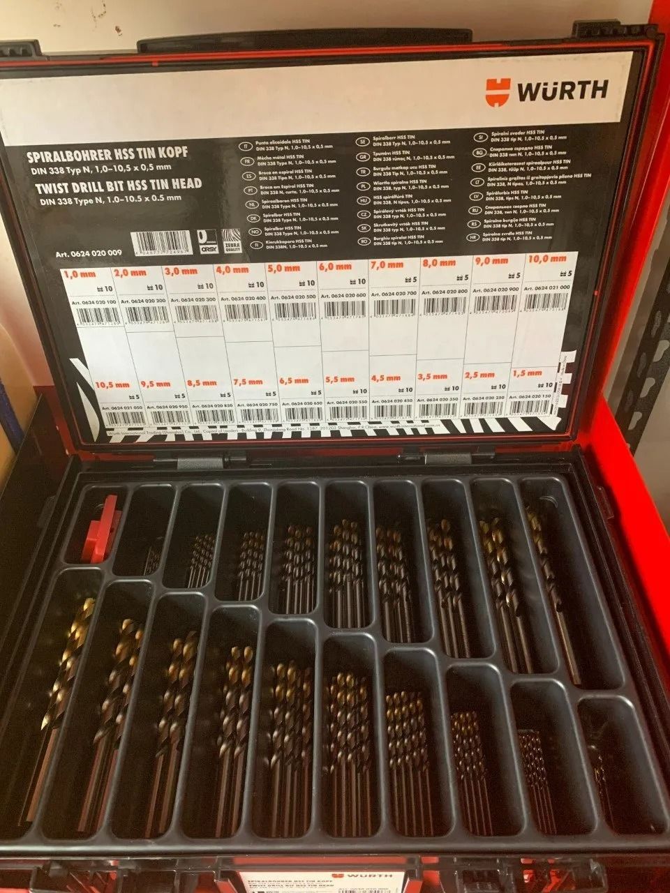Red Toolbox Open, Containing Multiple Drill Bit Sizes, Labelled 
