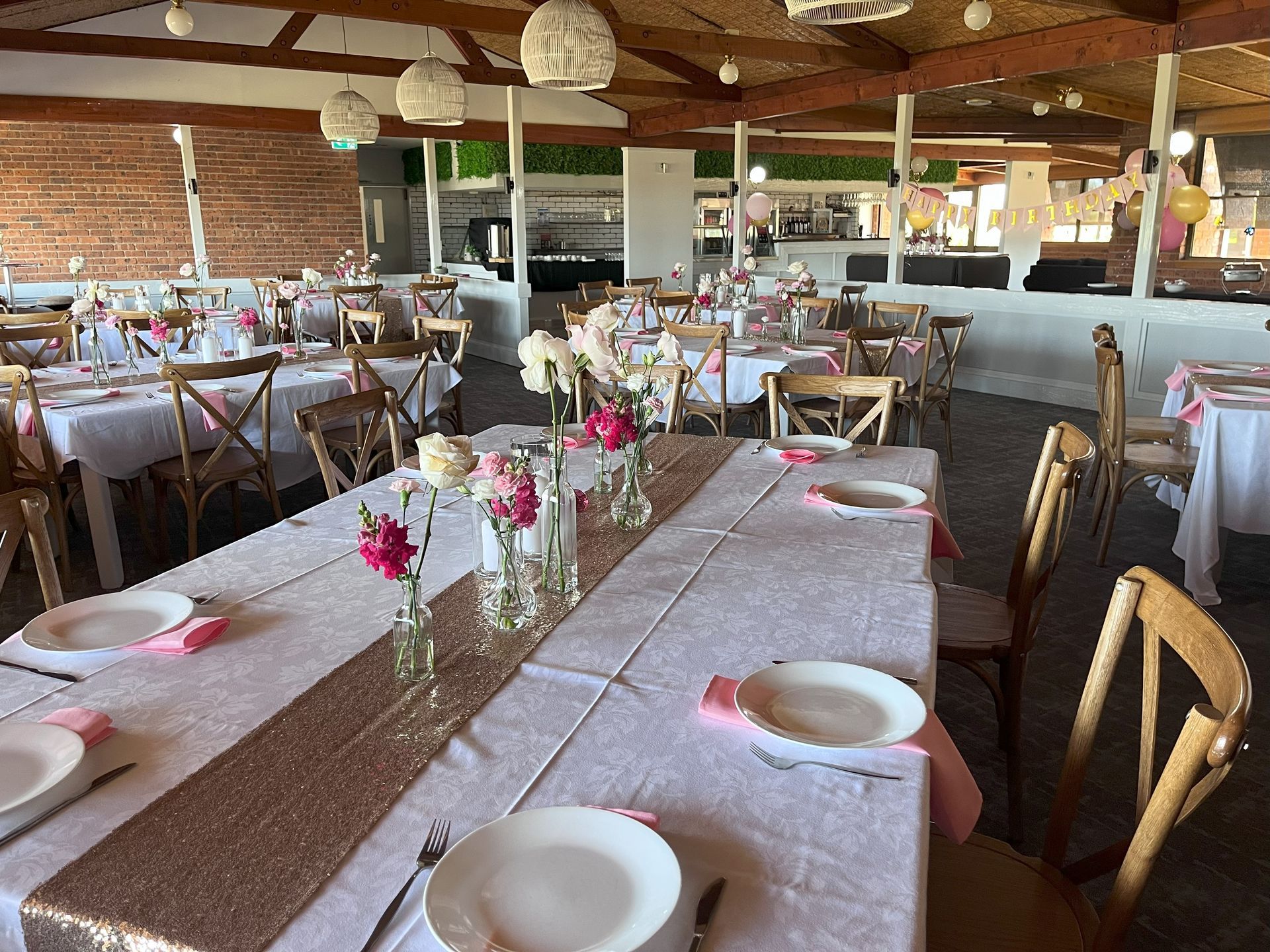 A Large Room with Tables and Chairs set Up for a Wedding Reception - Function Venue in Hillvue, NSW