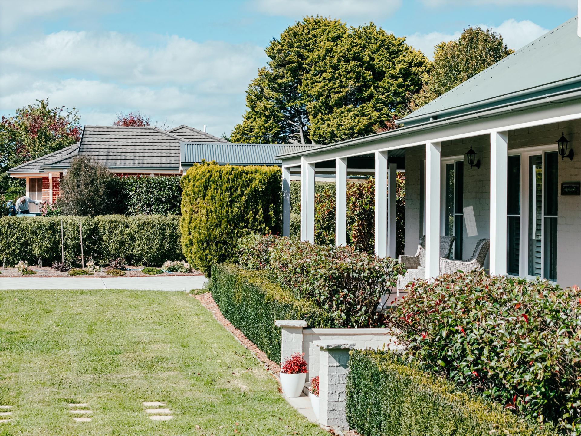 Sunny Suburban House With White Porch Columns — Mittagong Painting in Welby, NSW