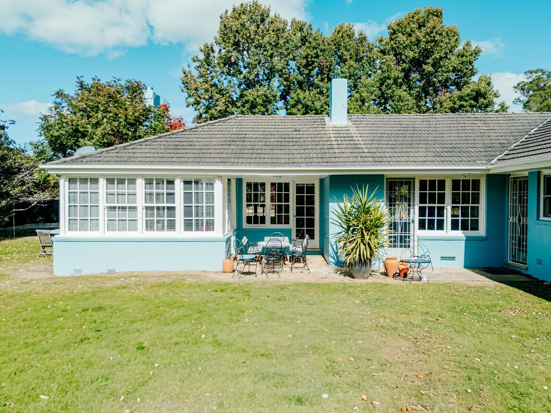 Blue Single-story House With a White Porch — Mittagong Painting in Welby, NSW