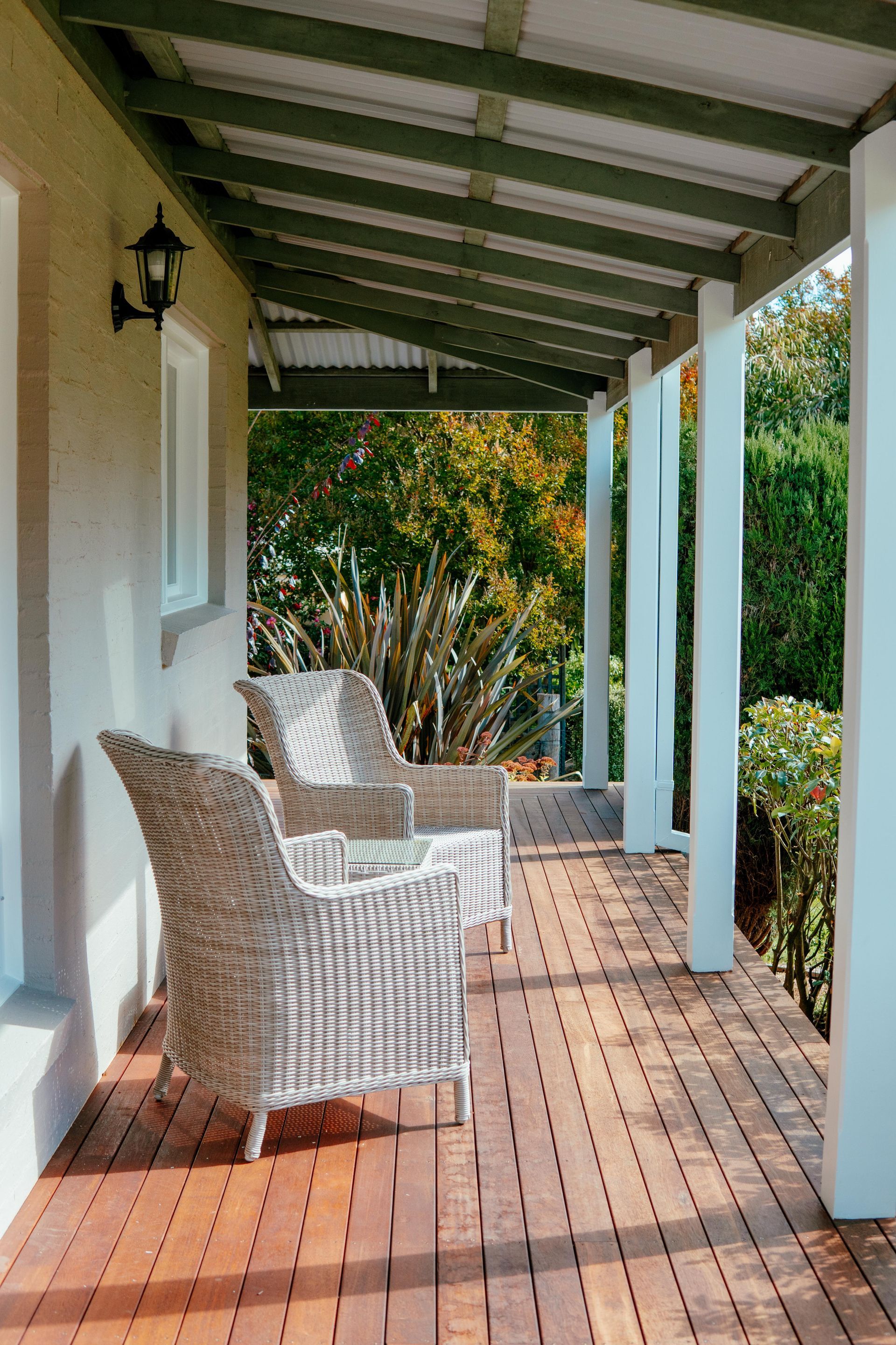 Covered Porch With Wicker Chairs — Mittagong Painting in Welby, NSW