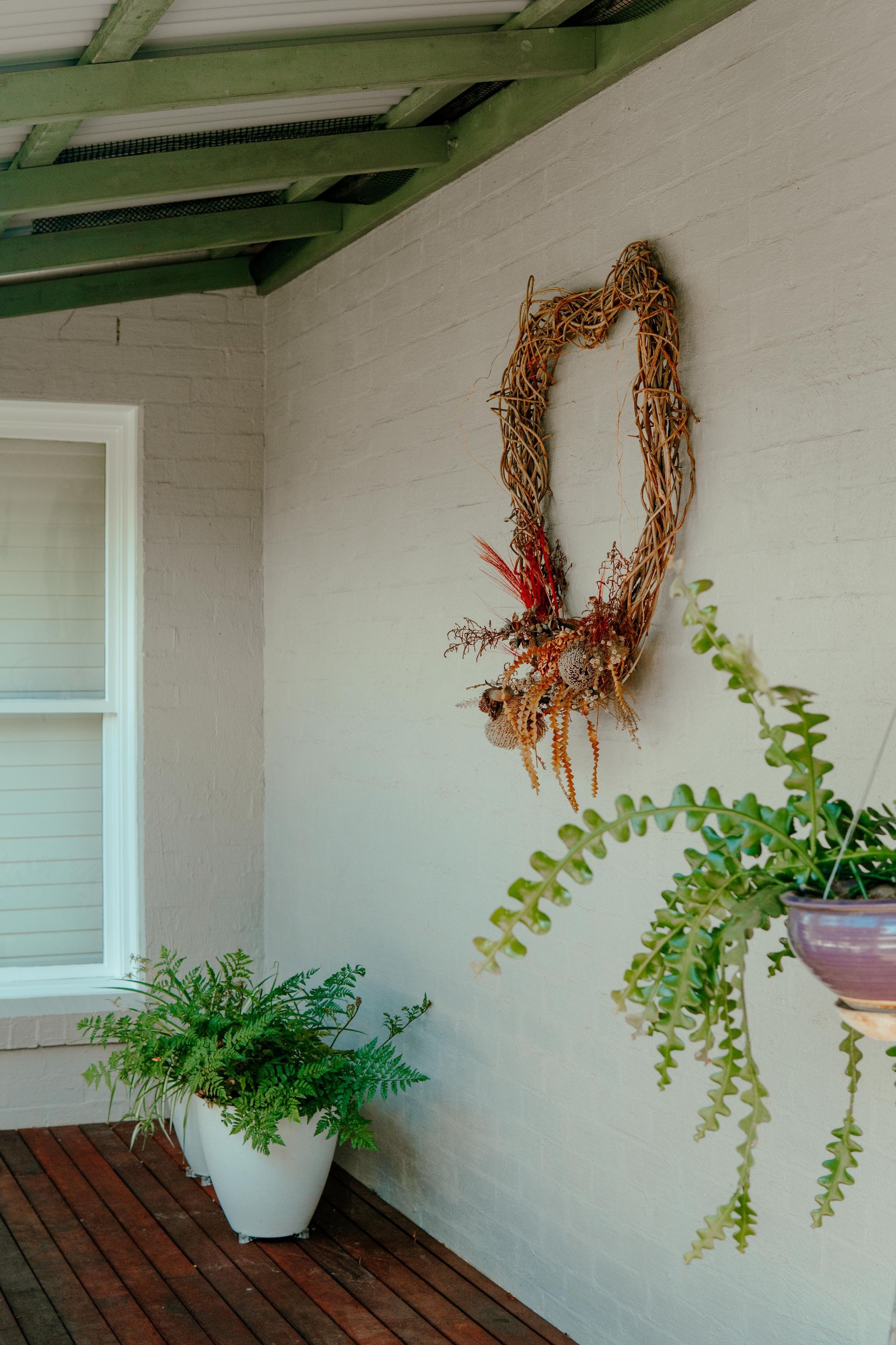 Porch With White Wall, Green Ceiling Beams — Mittagong Painting in Welby, NSW