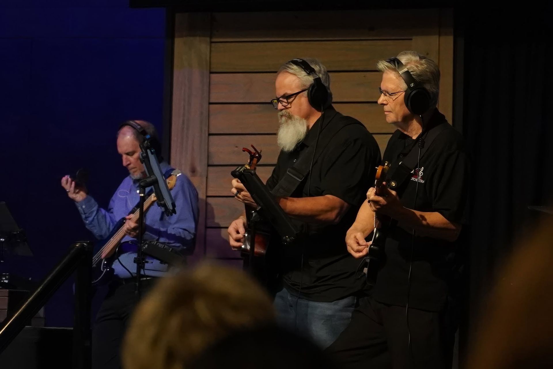 Guitarists playing with the worship band