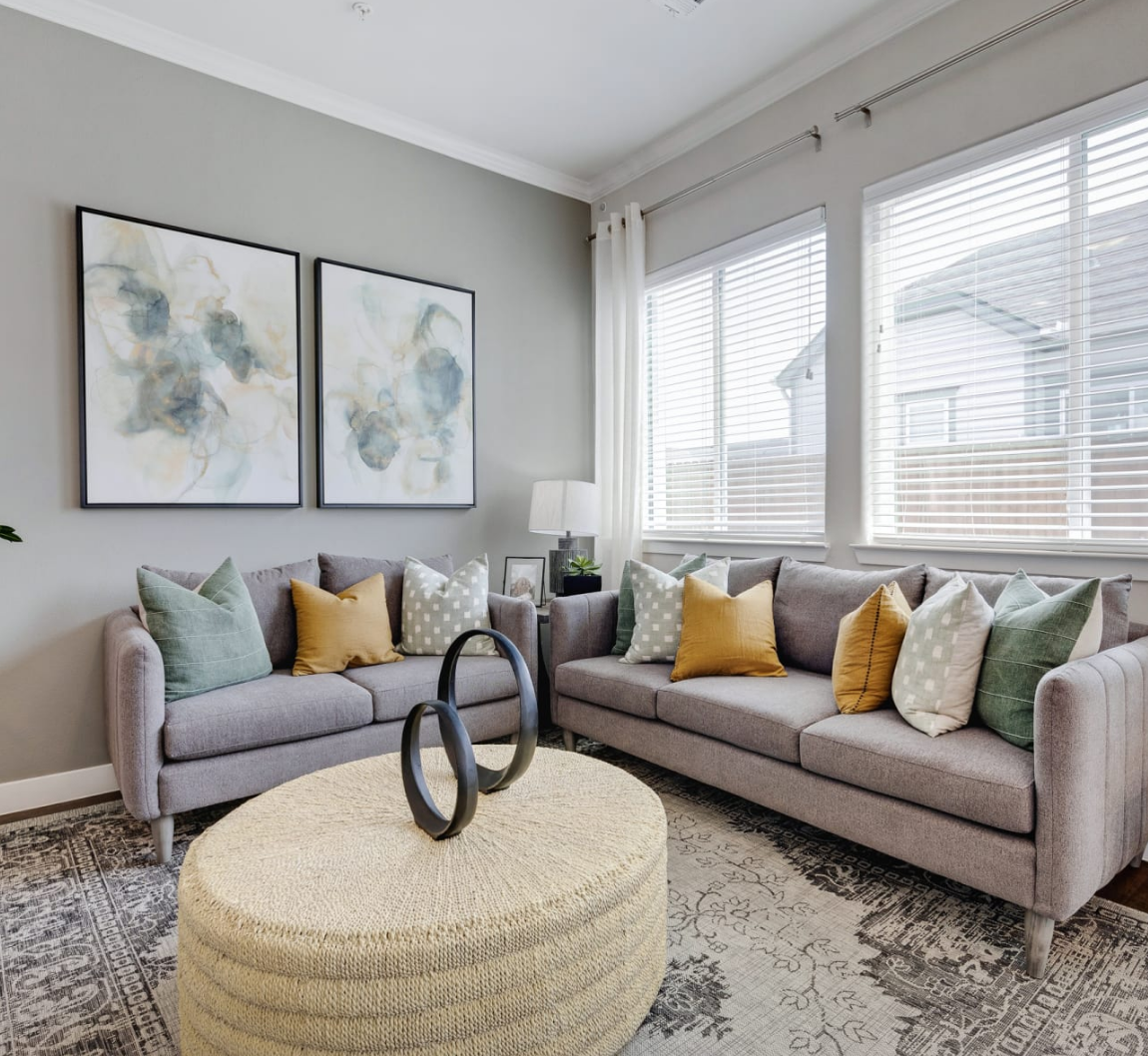 A living room with two couches and a coffee table.