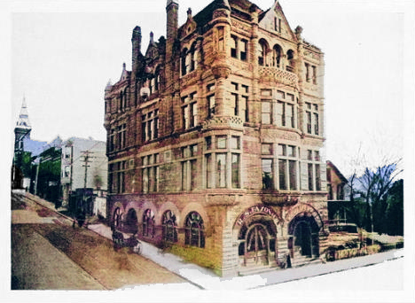 A large building with a lot of windows and arches