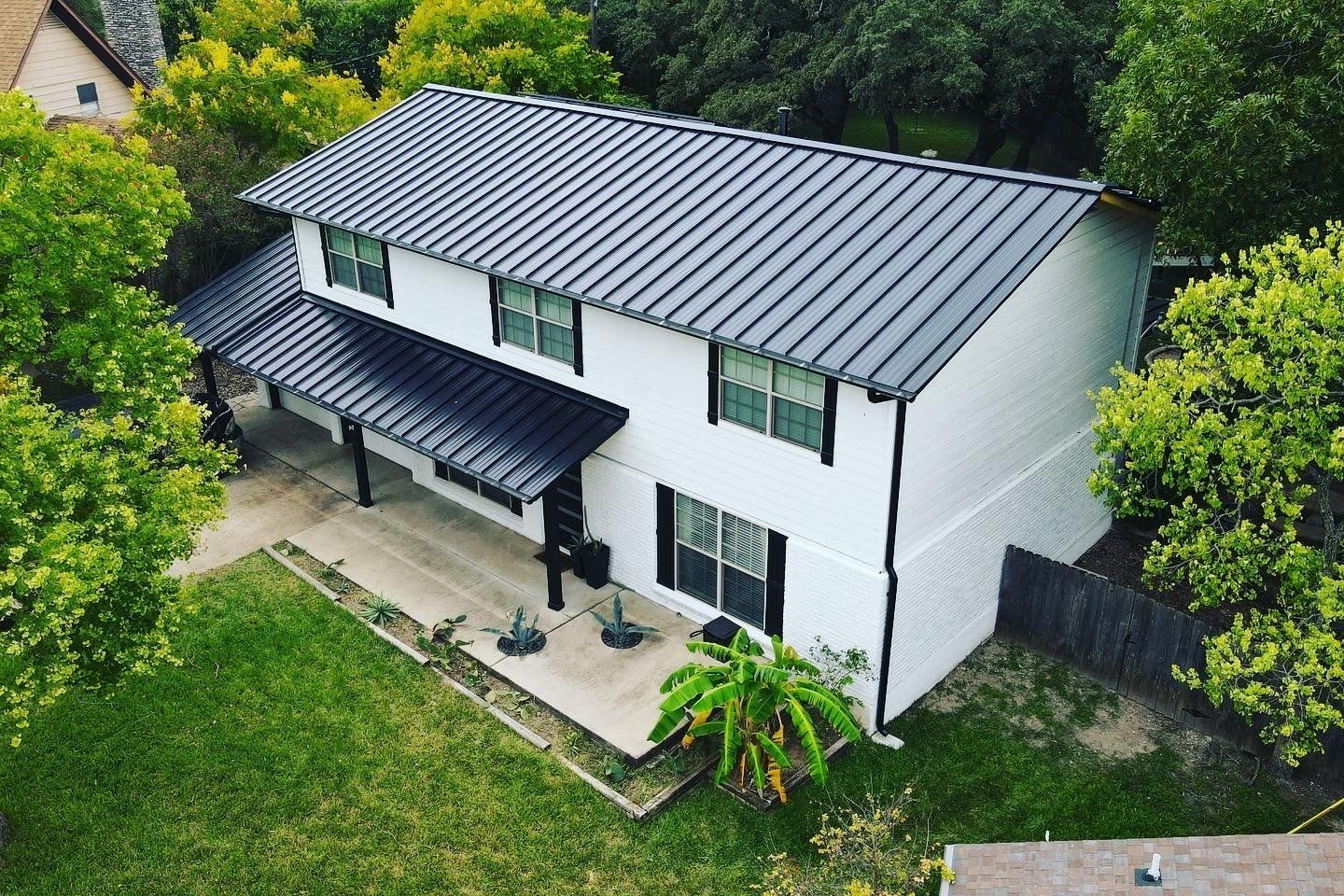 A beautiful metal roof on a home in Waco, Texas installed by Birdcreek Roofing