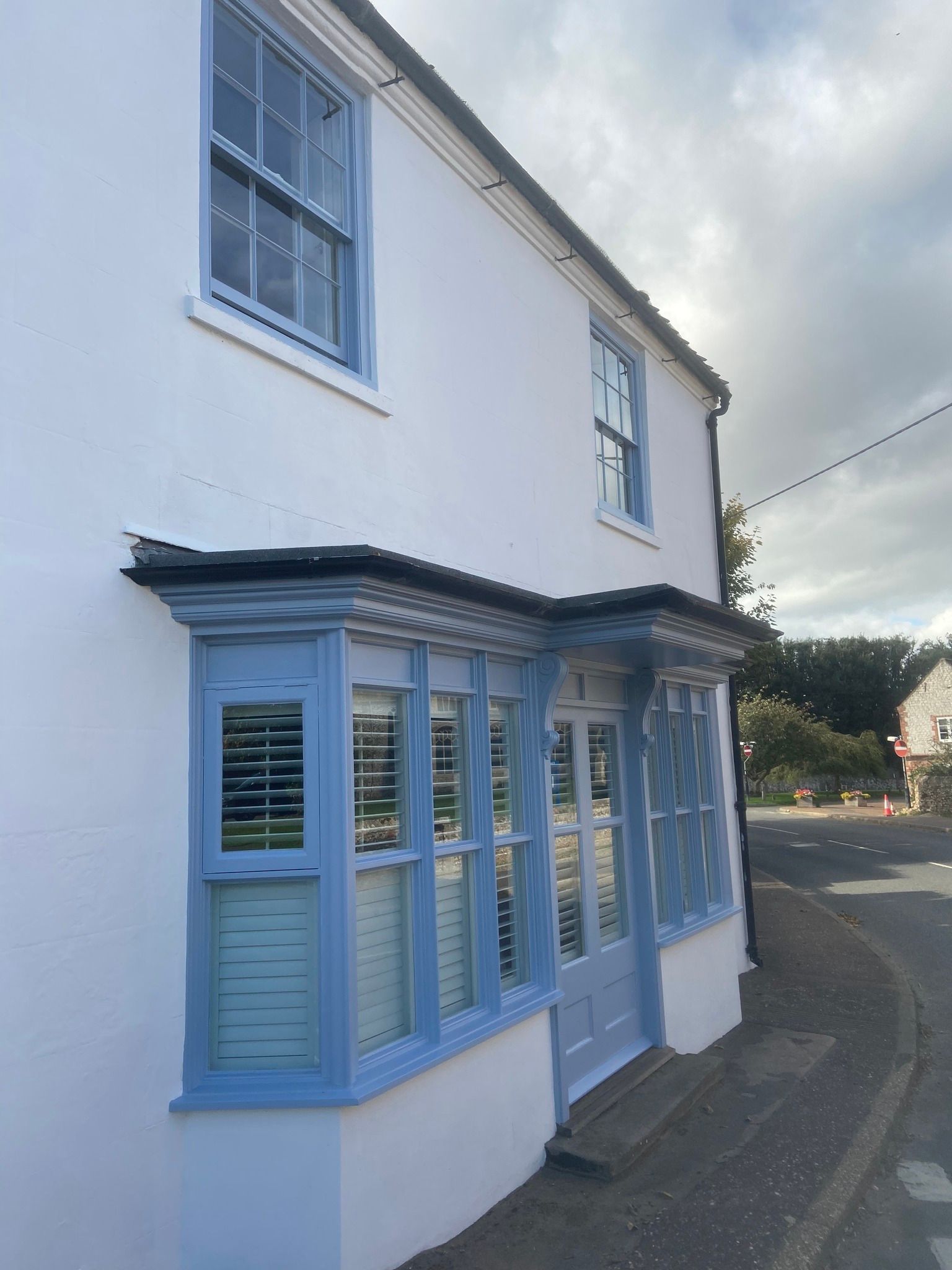 Exterior painting of walls & woodwork to house in Thornham