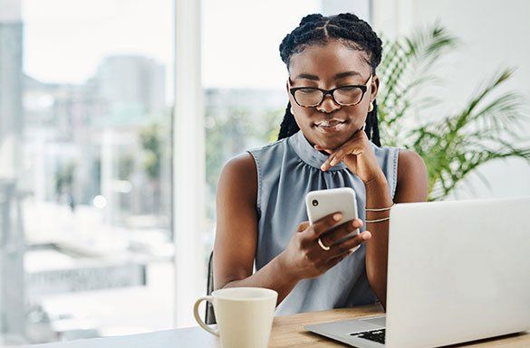 Woman Using Phone — Plano, TX — J Williams Group Woman Using Phone — Plano, TX — J Williams Group
