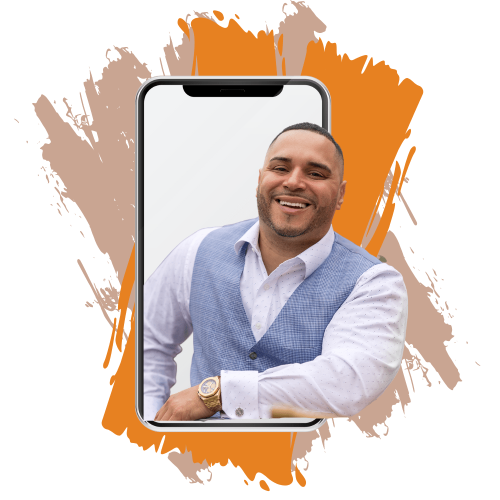 Man in blue vest smiles, inside a phone with an orange and brown splash behind.