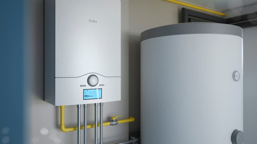 Boiler and A Water Heater In The Room — Russell Plumbing In Manunda, QLD