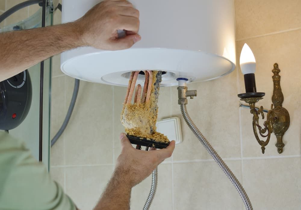 Replacing Hot Water System In The Bathroom — Russell Plumbing In Manunda, QLD