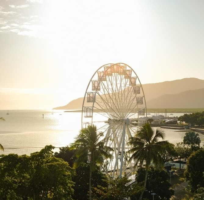 A Ferris Wheel In The Middle Of A Body Of Water — Russell Plumbing In Cairns, QLD