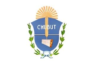 Escudo de armas provincial de Chubut con escudo azul, sol radiante y ramas de laurel.