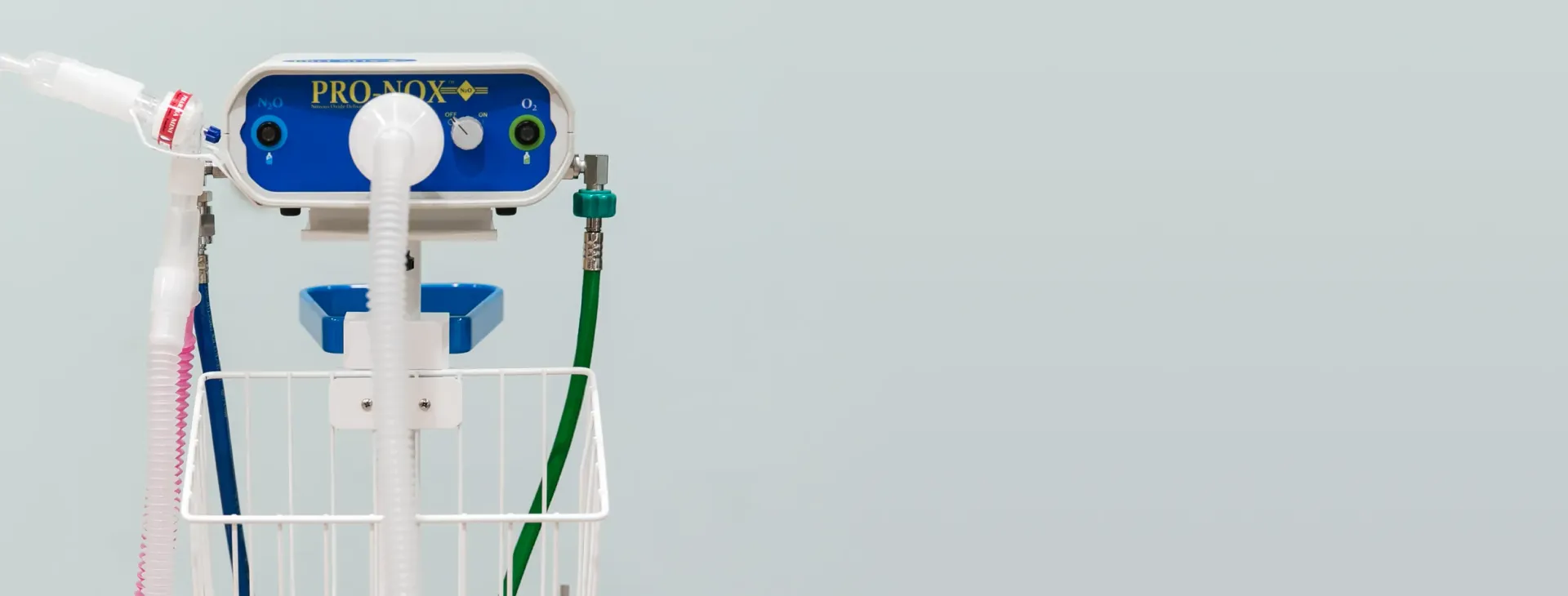 PRO-NOX medical equipment with tubes and a blue panel.