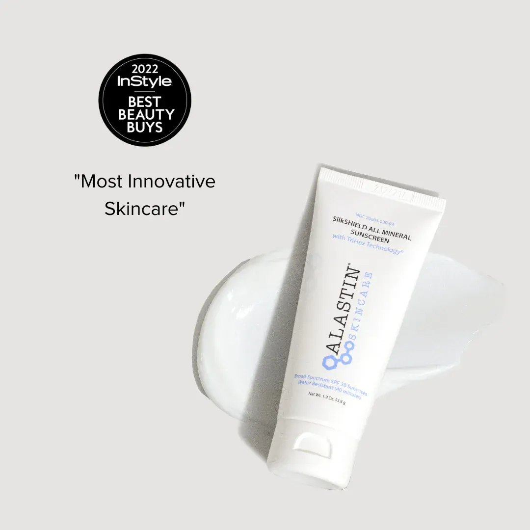 White tube of QALASTIN 8% Eye Cream with a white smear of cream on a white background, 