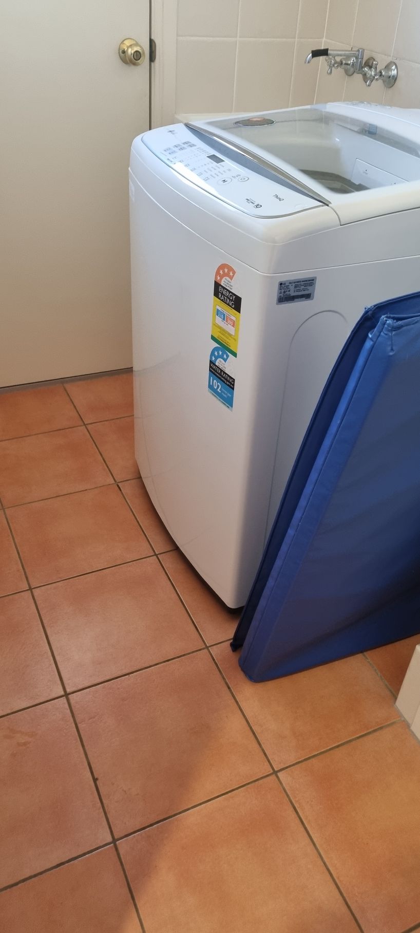 A Washing Machine in a Laundry Room — RWM Cleaning in Deception Bay, QLD