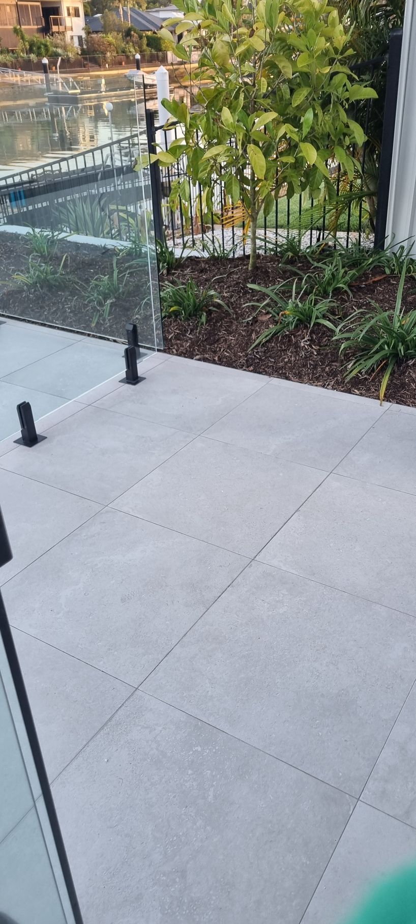 Patio With Gray Tiles — RWM Cleaning in Deception Bay, QLD