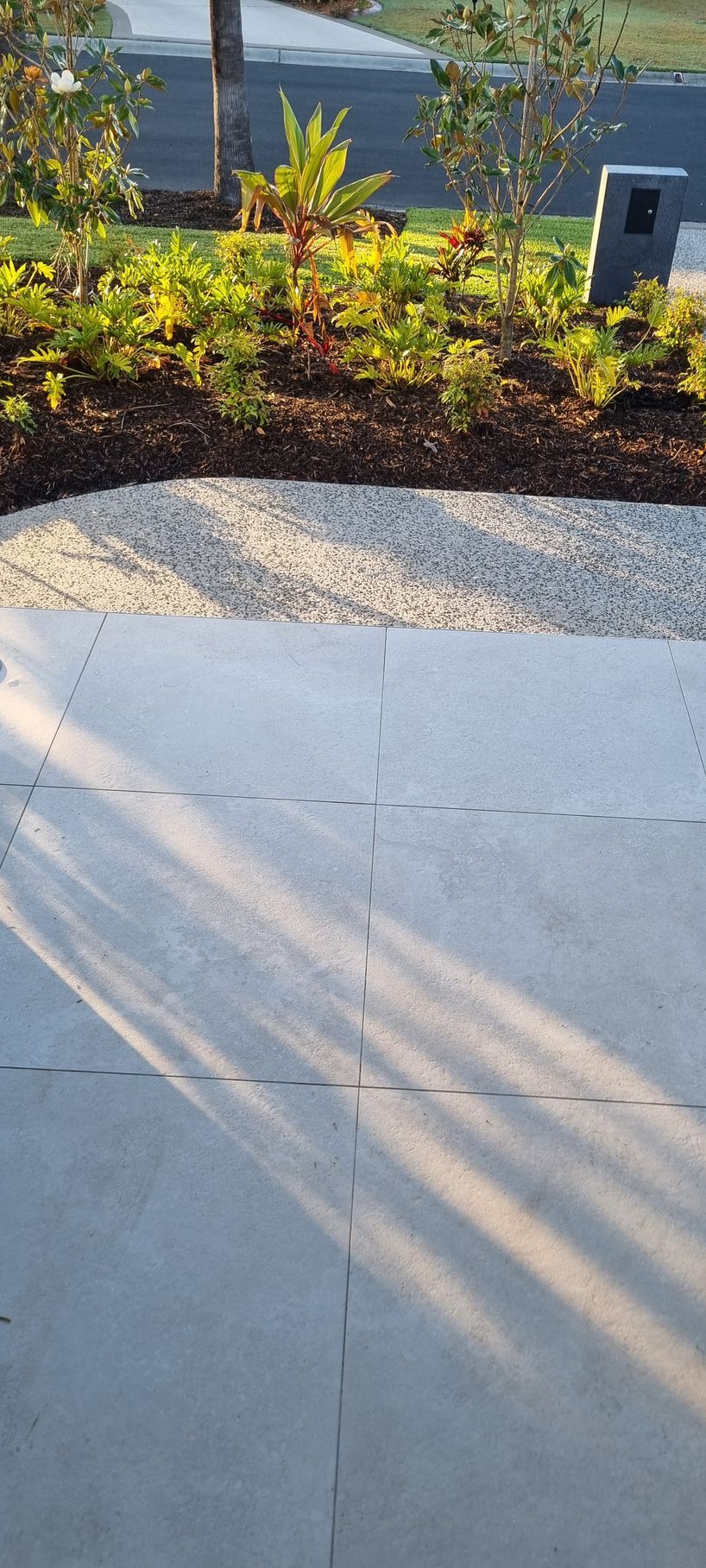 Stone Pavers With Sunlight Shadows — RWM Cleaning in Deception Bay, QLD