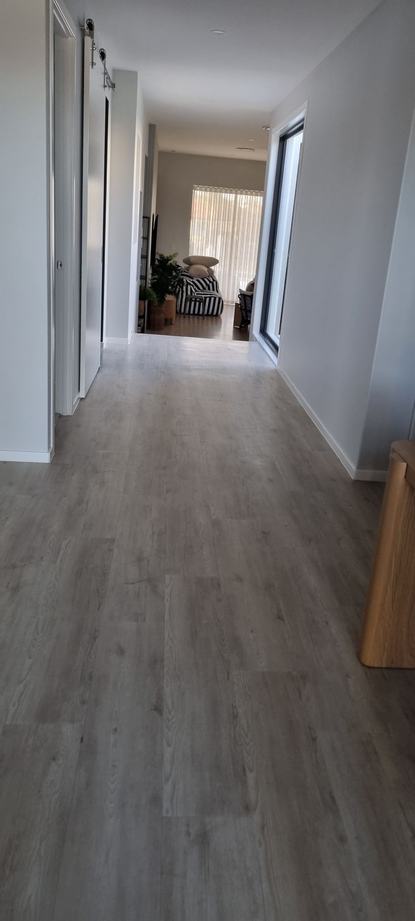 Hallway With Gray Wood-look Flooring — RWM Cleaning in Deception Bay, QLD