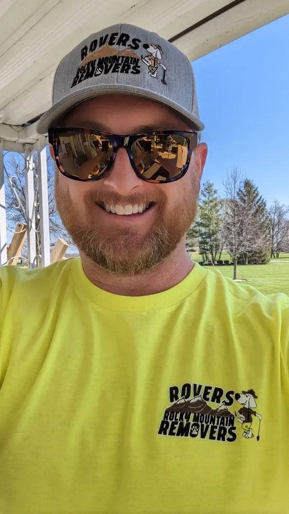 Rovers Rocky Mountain Removers technician ready to provide pooper scooper service in Celina Ohio